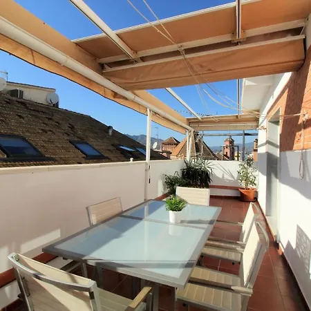 Homes Atico Larios Apartment
